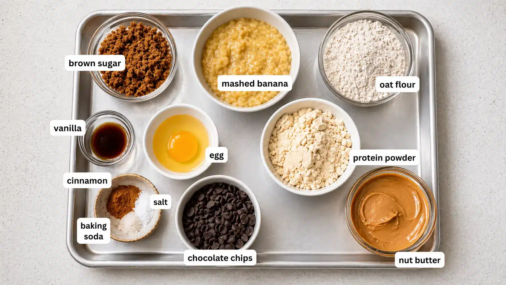 ingredients for banana protein cookies on a kitchen counter