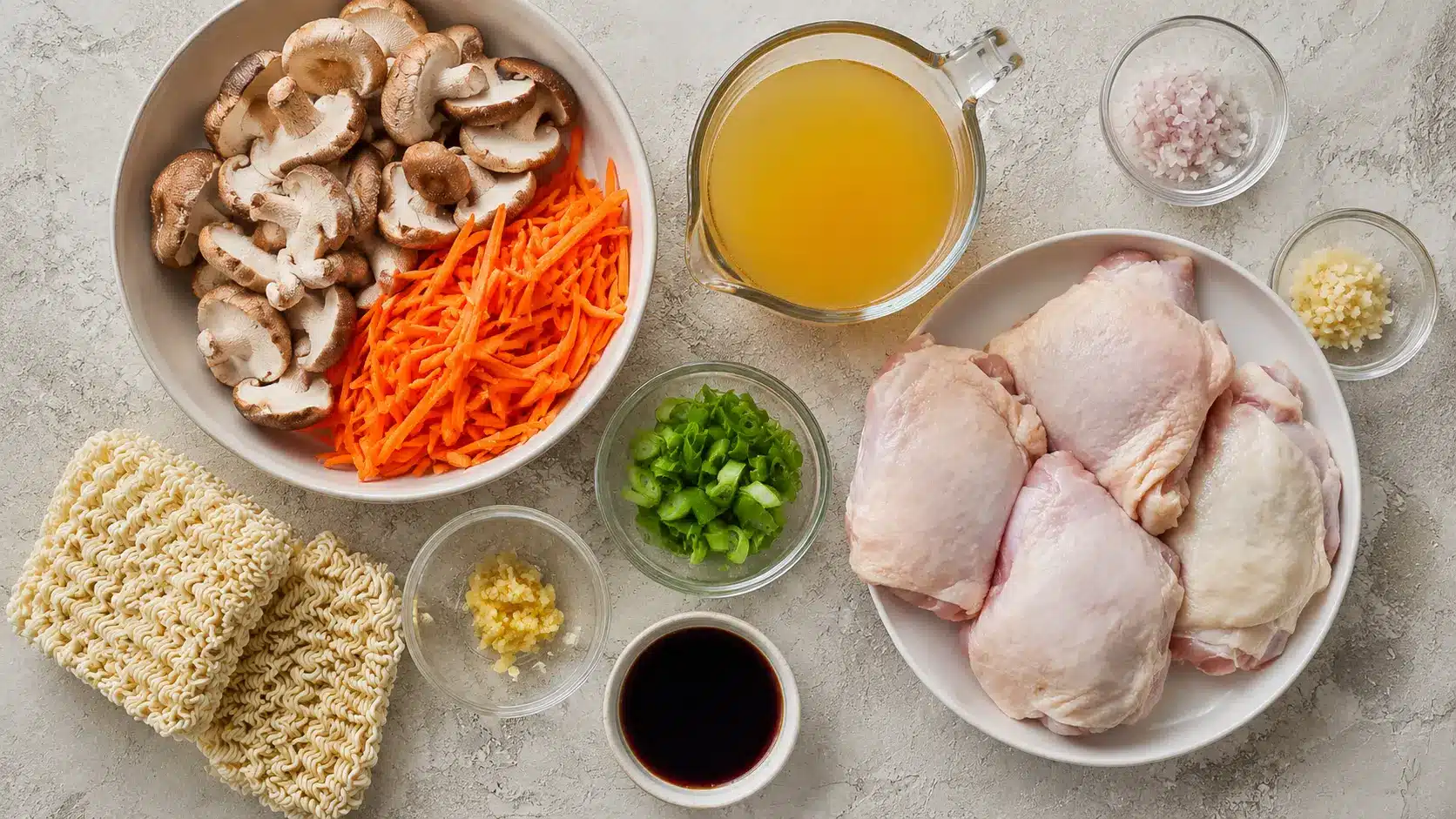 Chicken Ramen Recipe: Quick Homemade Comfort Bowl 9 ingredients for chicken ramen recipe arranged on marble surface